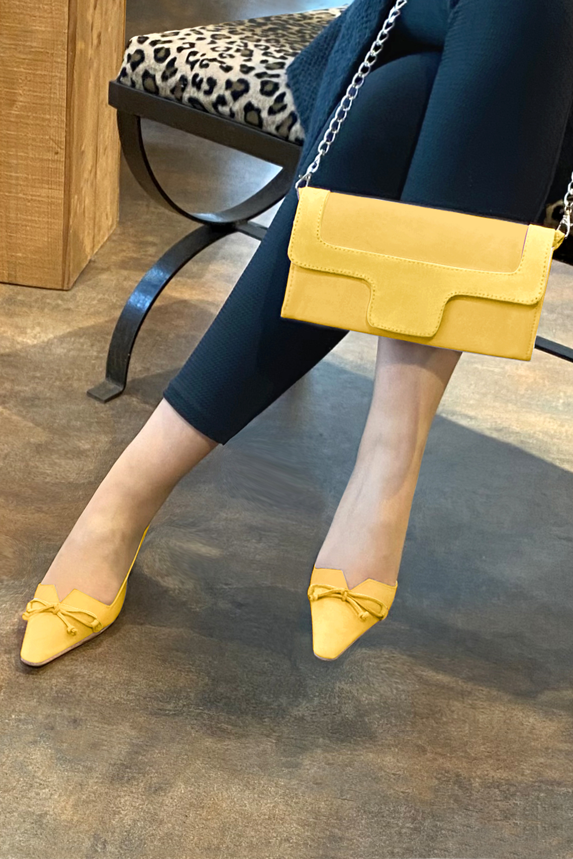 Yellow women's open back shoes, with a knot. Tapered toe. Low kitten heels. Worn view - Florence KOOIJMAN